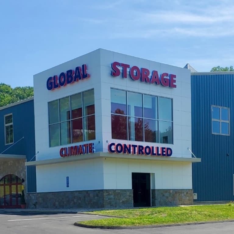 The Global Self Storage building at 265 West High Street, East Hampton, with CLIMATE CONTROLLED lettering across the front