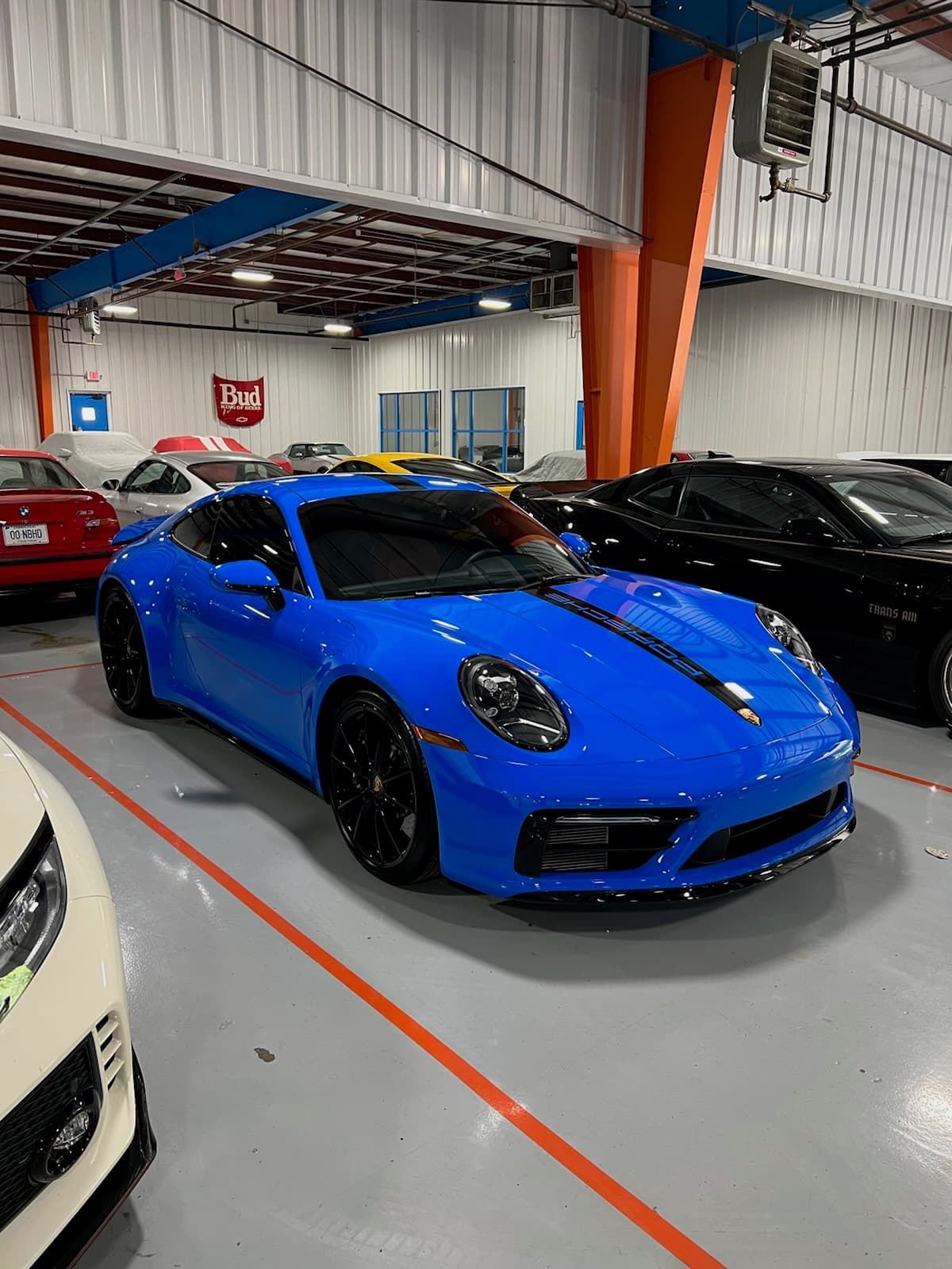 A Porsche 911 Turbo parked indoors