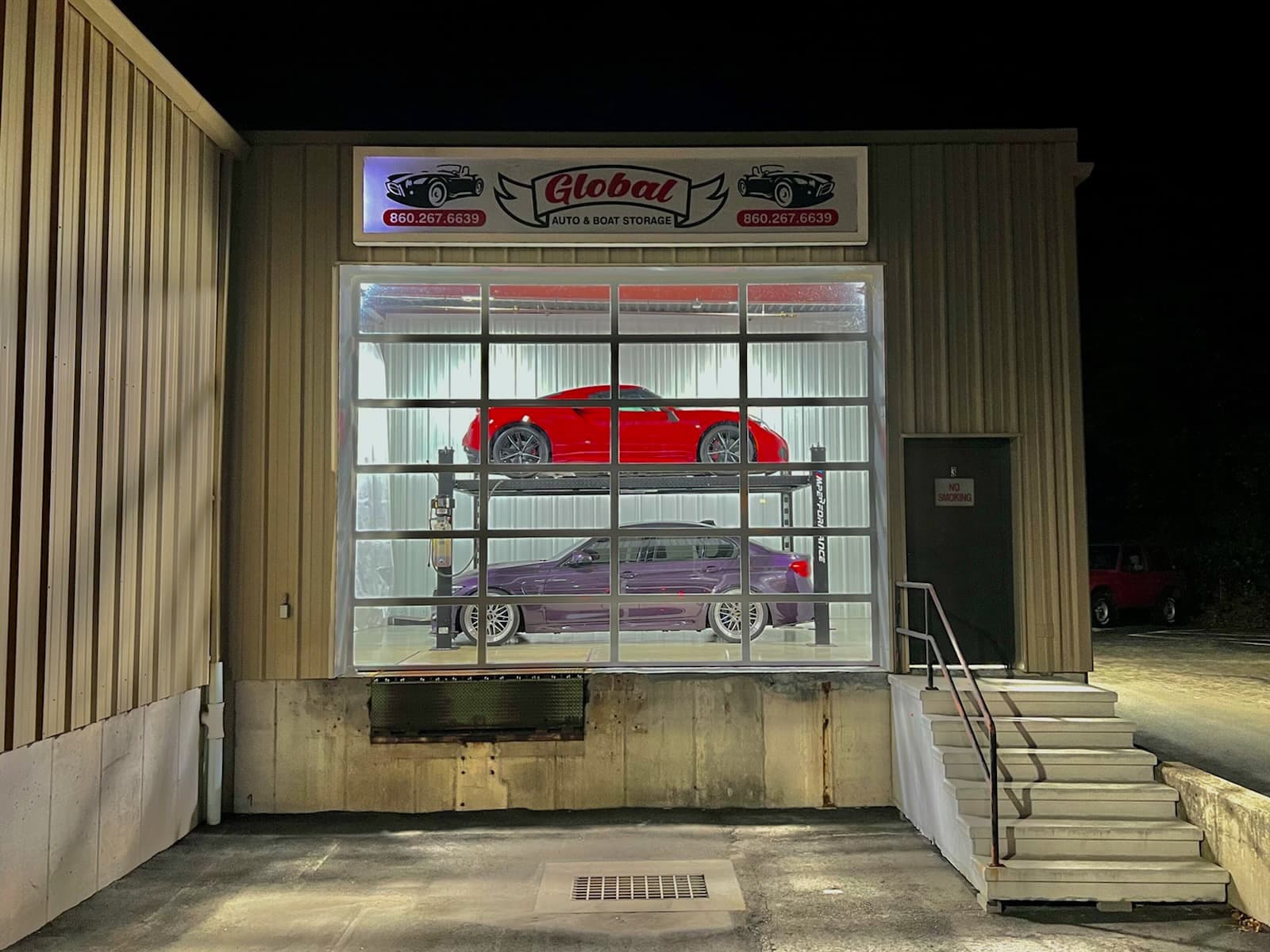 The vehicle building's door lit at night